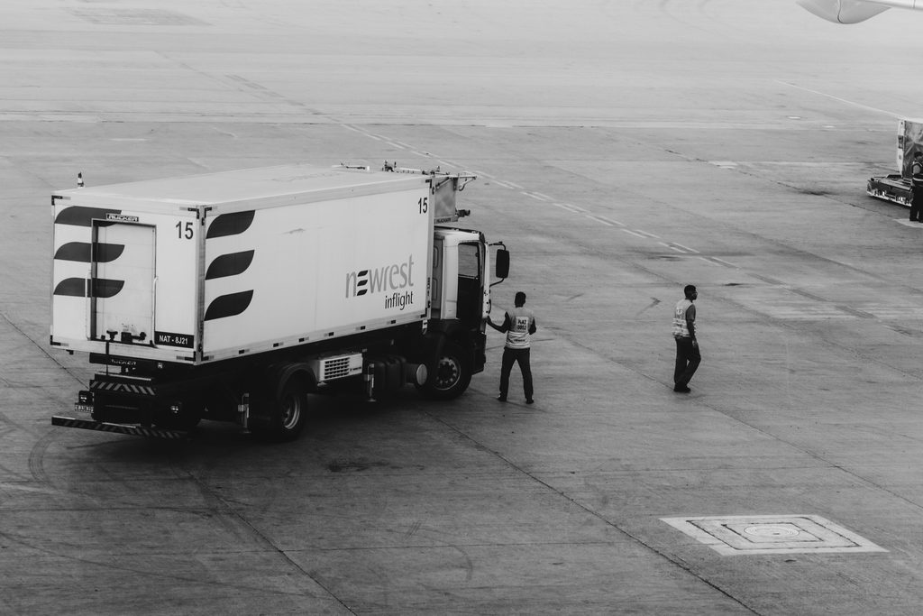 our-experience A truck being checked for inspection of packages for the security of the customs.